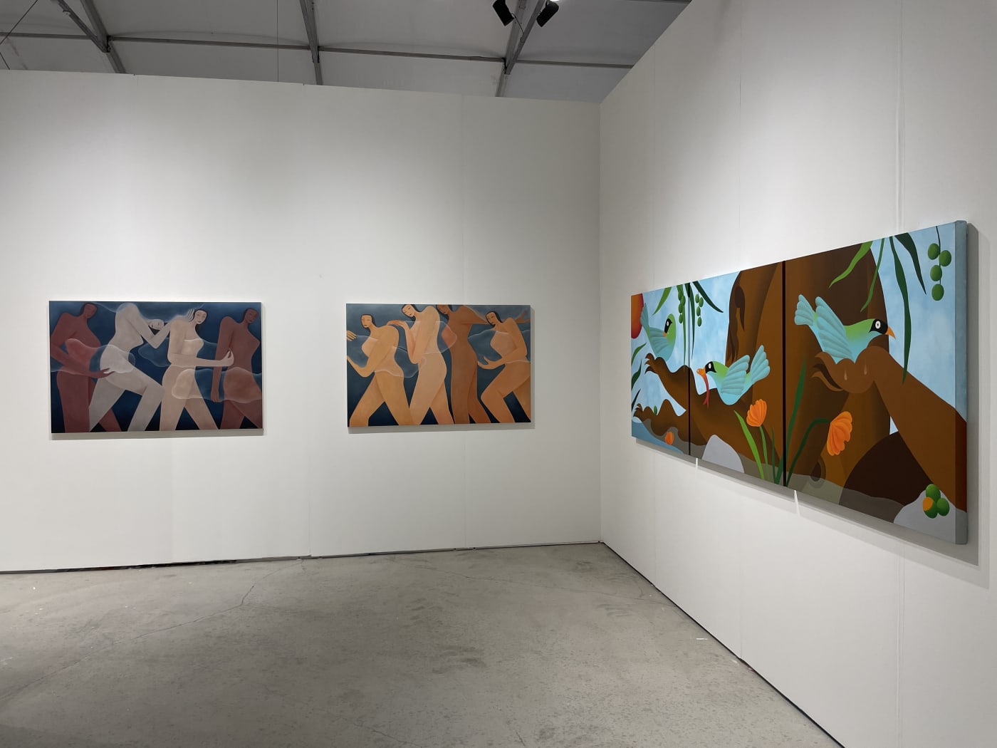 Installation image from Art Miami of paintings by Laura Berger and Bianca Nemeic