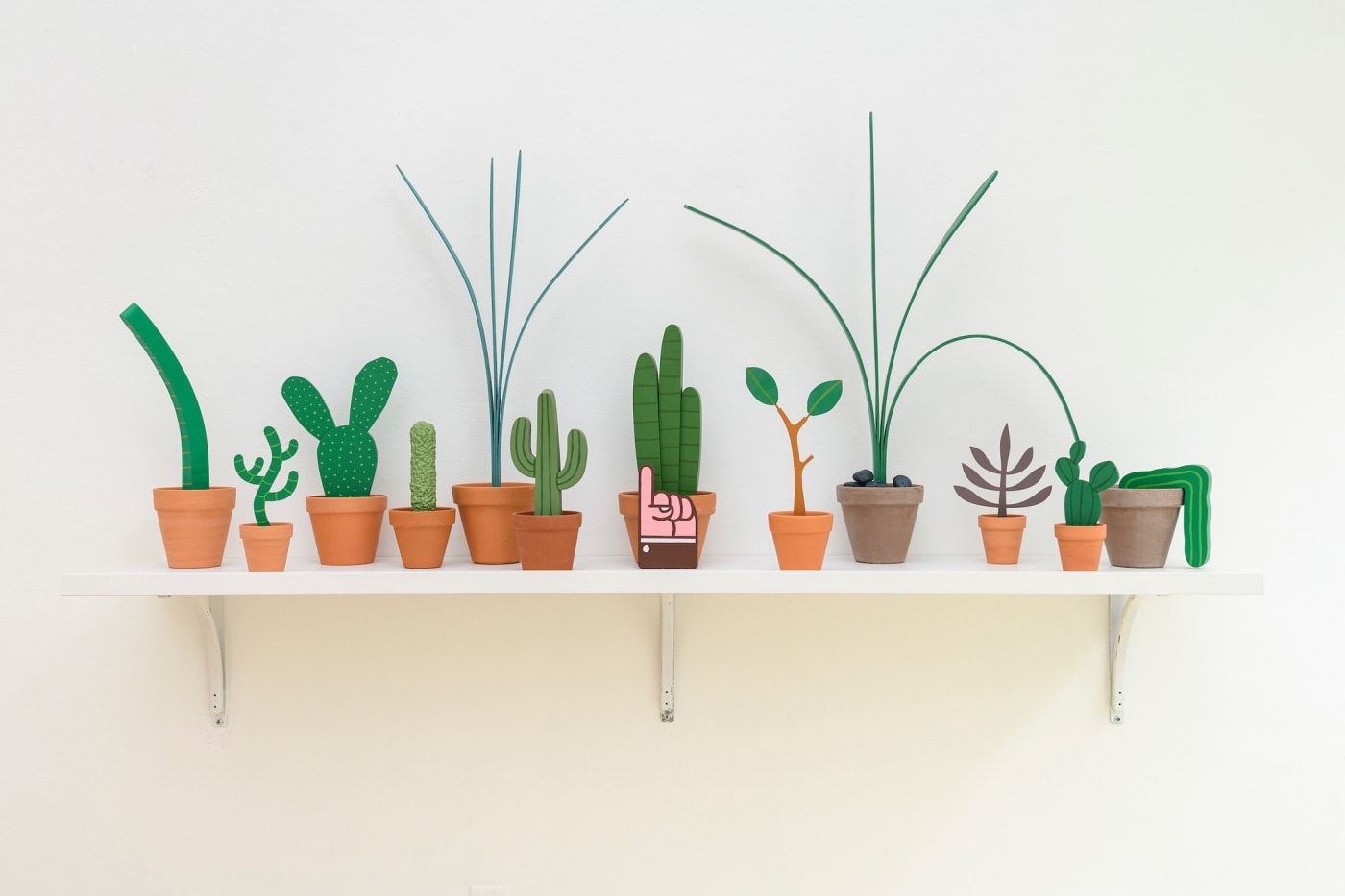 installation photos of Jeff Canham's show with plant sculptures  