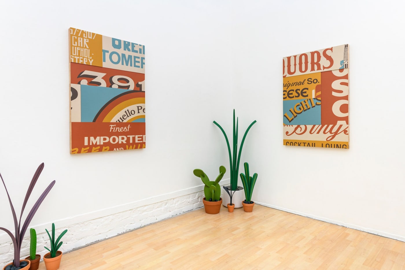 installation photos of Jeff Canham's show with plant sculptures and signs 