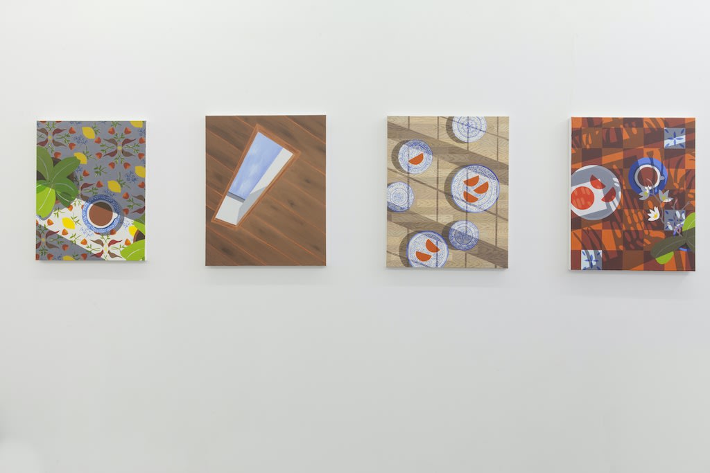 Installation view of "Buscando Recuerdos" group exhibition, Natalia Juncadella multicolored still life paintings on gallery wall 