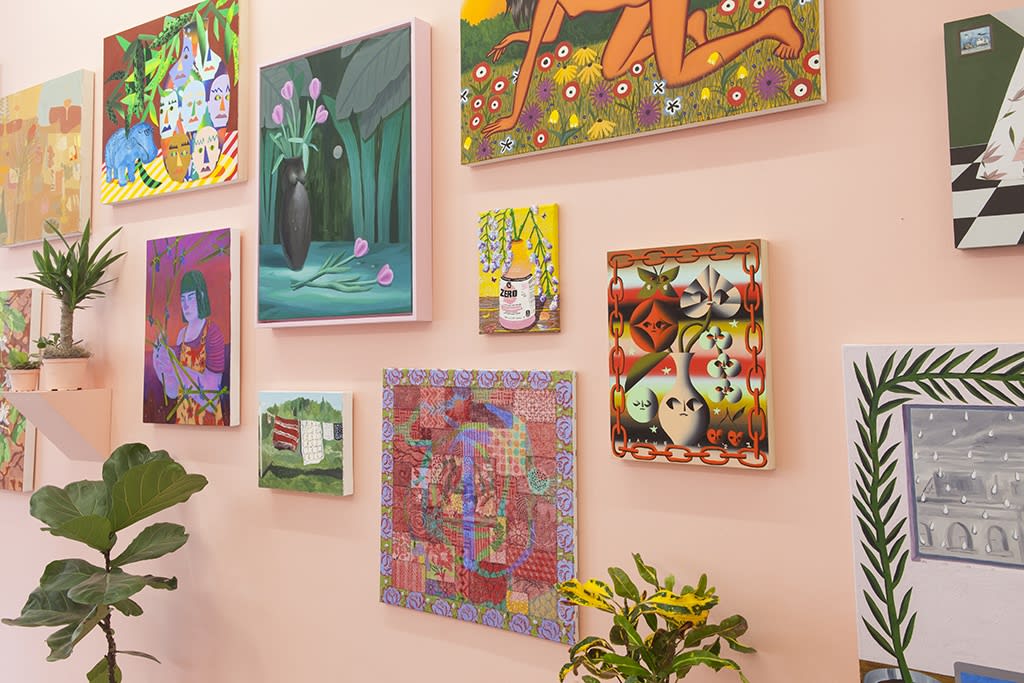 installation view of Lush 2022, gallery with peach walls and floral / plant themed artwork