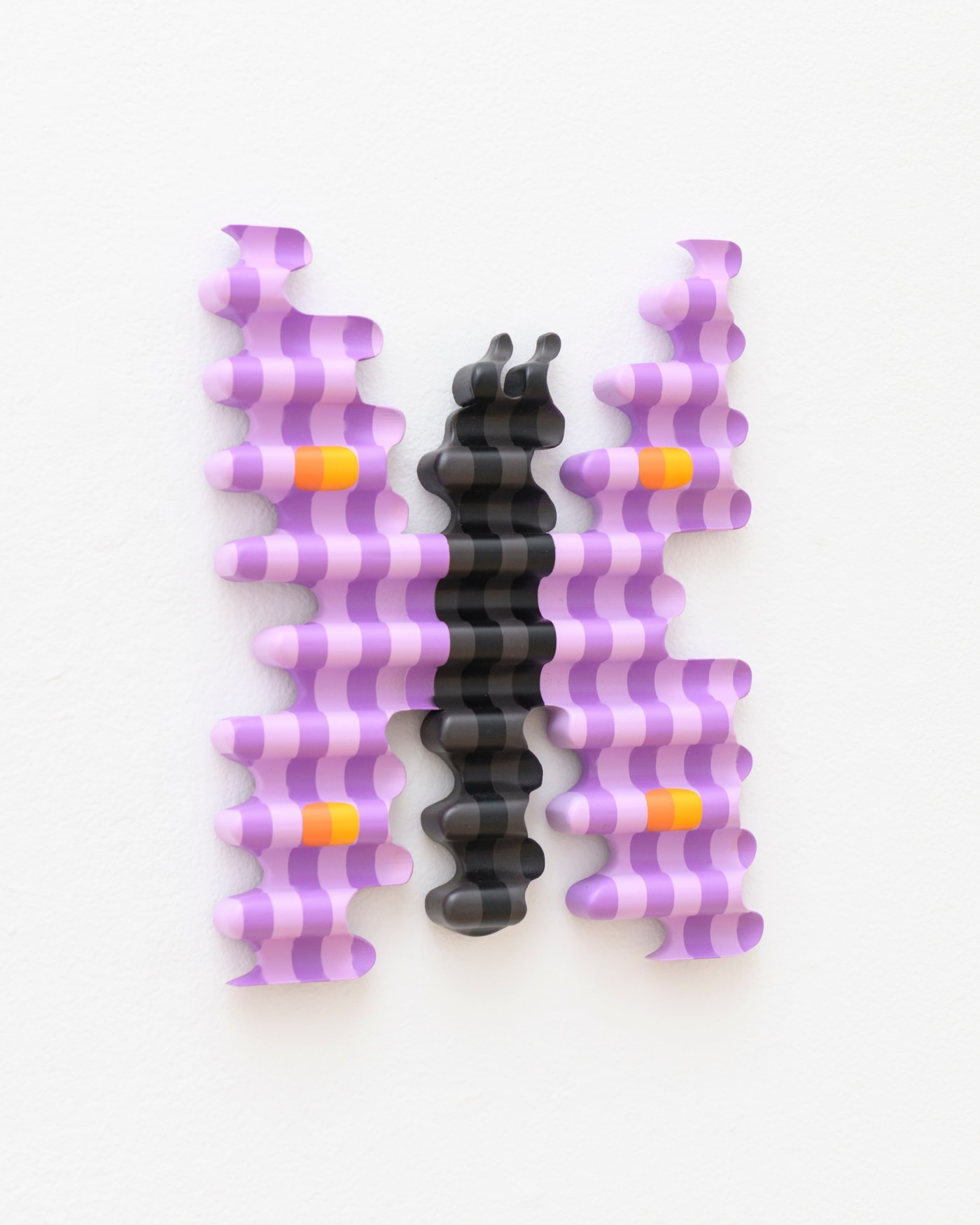 a photo of Casey Grey's butterfly sculpture at his gallery installation 
