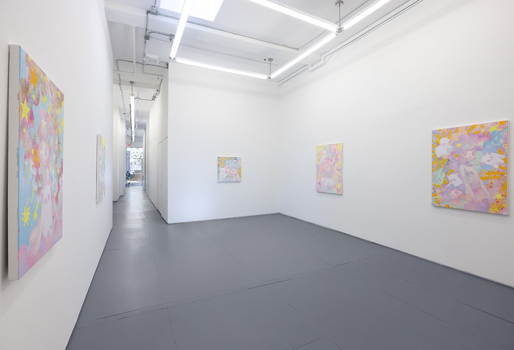 art installation image of five paintings from artist So Youn Lee in white walled room facing a hallway