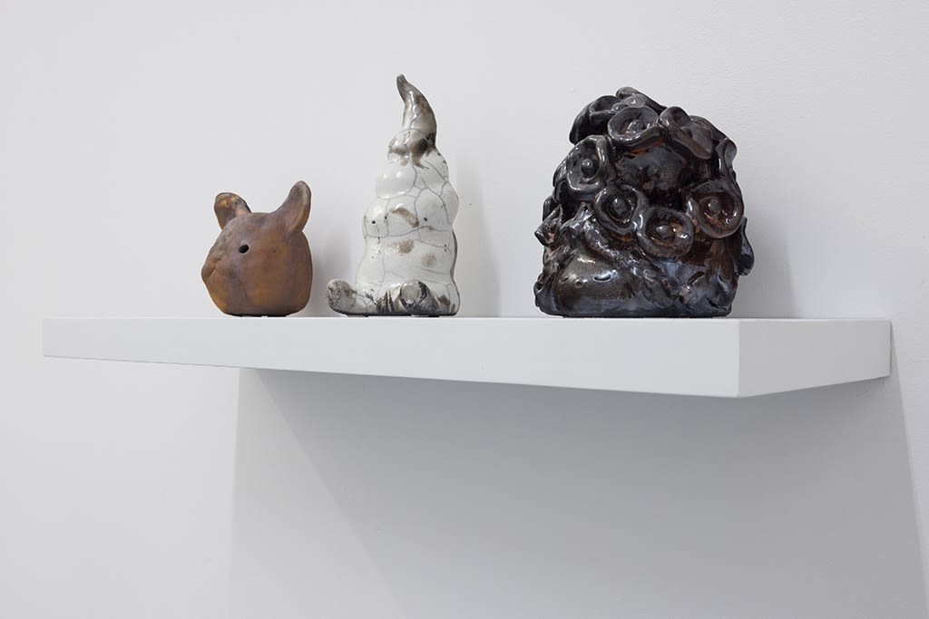 art installation image of 3 sculptures by artist So Youn Lee in white walled room for her show "Over The Moon"