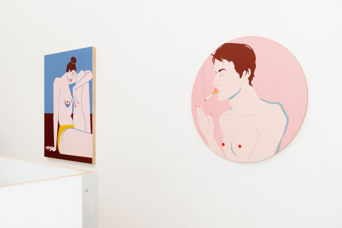 Installation shot of office wall with paintings Bad Habit and Disappoint