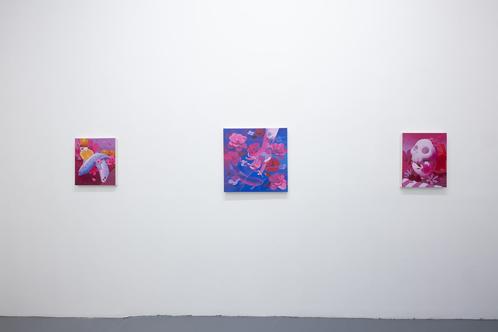 installation image of bright colored paintings by Megan Ellen Macdonald