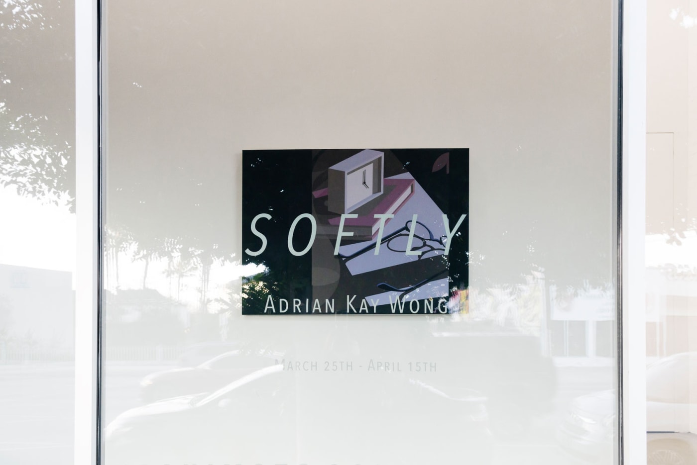Installation view of Adrian Kay Wong's painting Softly at the front of the gallery through the front gallery window.