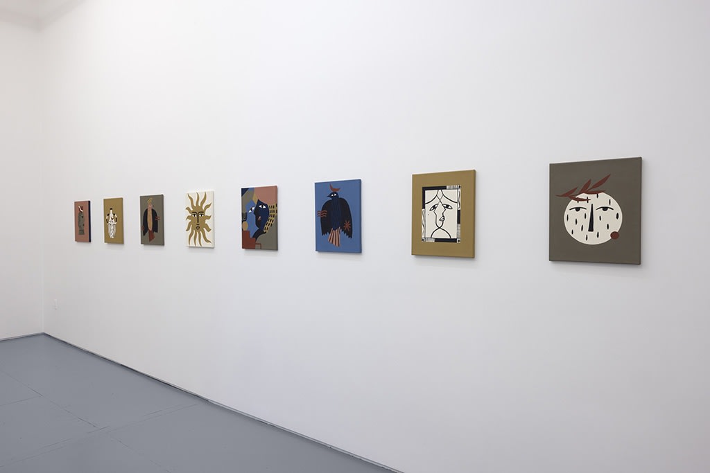 Installation image of collage like artworks from artist Madi