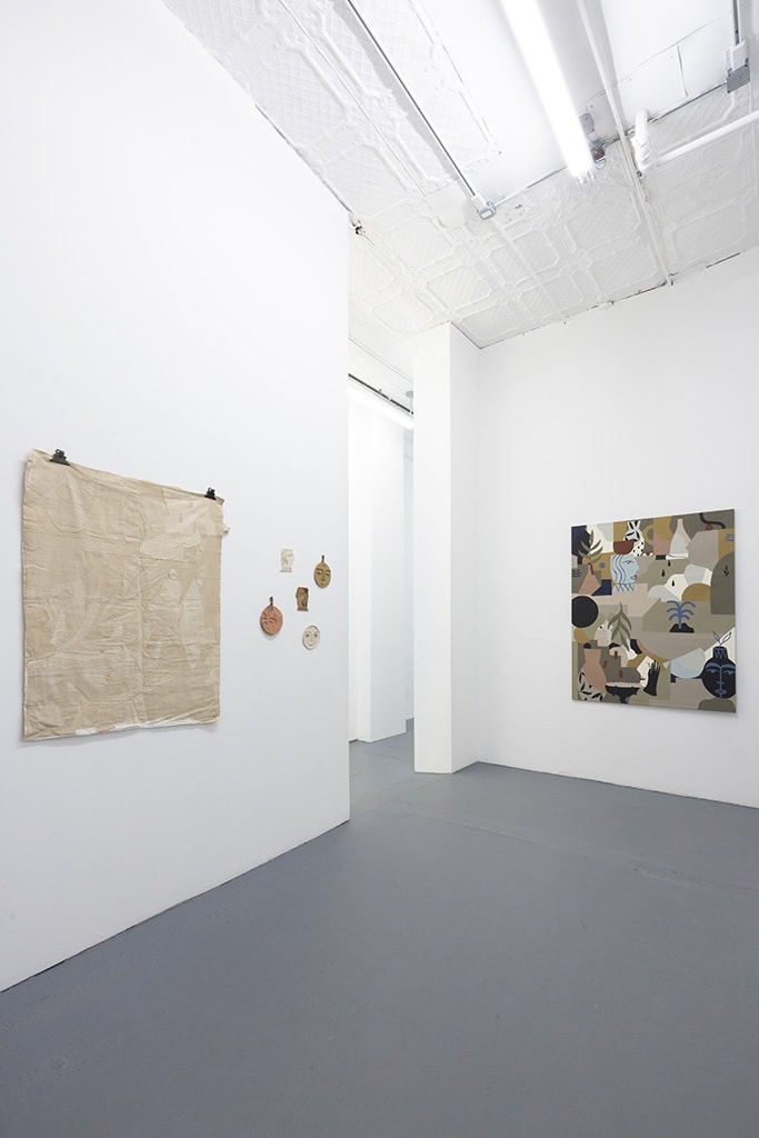 Installation image of collage like artworks from artist Madi