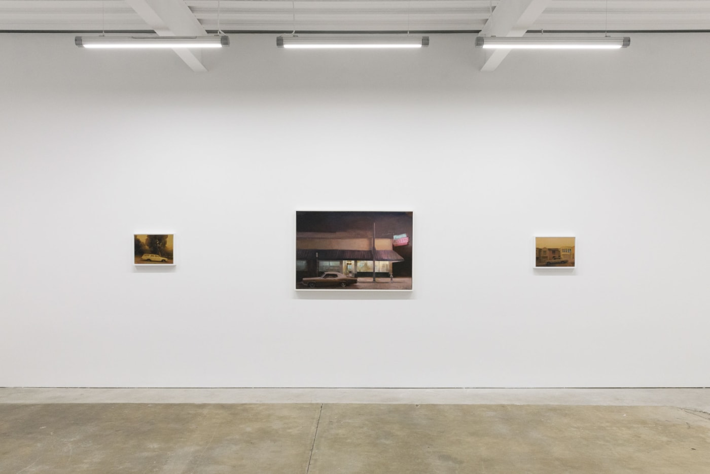 Installation image of Embers. Paintings - Family Roadtrip, Slice of Life, Fire In The Sky (left to right) at Hashimoto Contemporary San Francisco