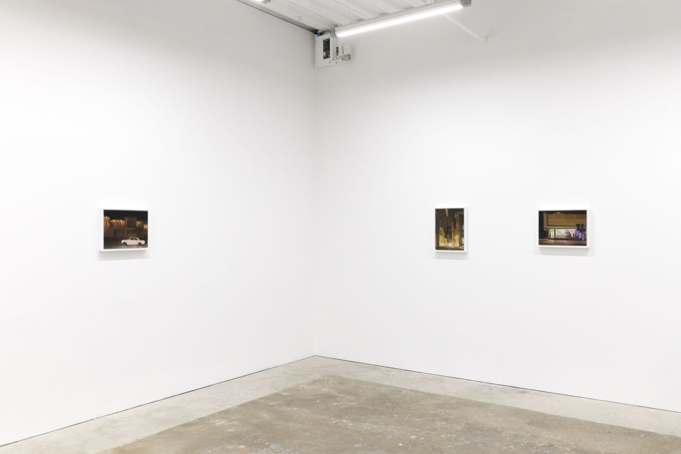 Installation image of Embers. Paintings - Lights Cheer Up, Shortcut Through Cosmo Pl, Daily Dozen (left to right) at Hashimoto Contemporary San Francisco