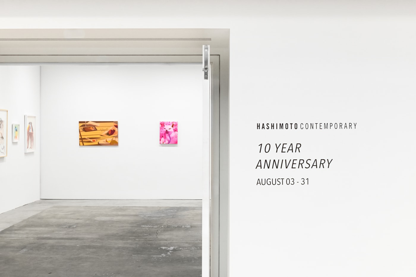 photo of the outside of Hashimoto Contemporary San Francisco gallery, displaying wall vinyl that reads Hashimoto Contemporary 10 Year Anniversary, August 03 - 31