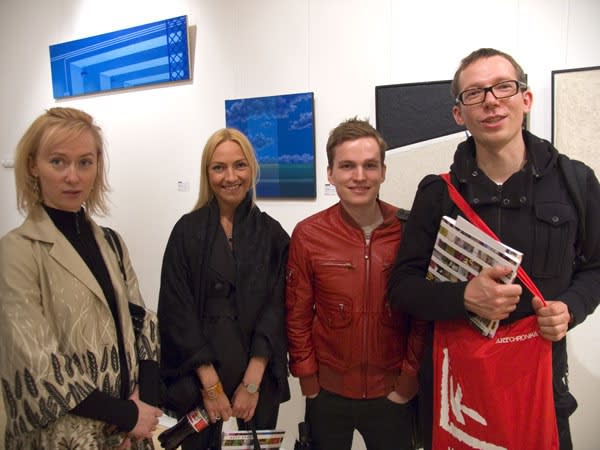 Katerina Belkina, Anna Dobrovolskaya-Mints, Oleg Dou, Anton Belov against the backdrop of works by Stas Shurip from the collection of Anna Dobrovolskaya-Mints and Pavel Ananenko