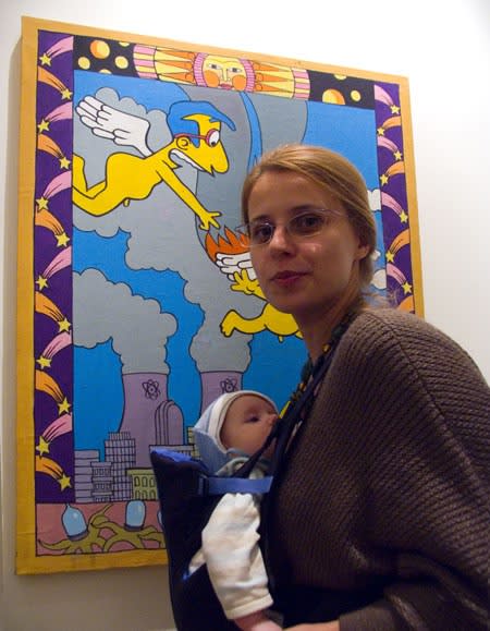 Mikhail Popov in front of the work of Alexander Savko from his own collection