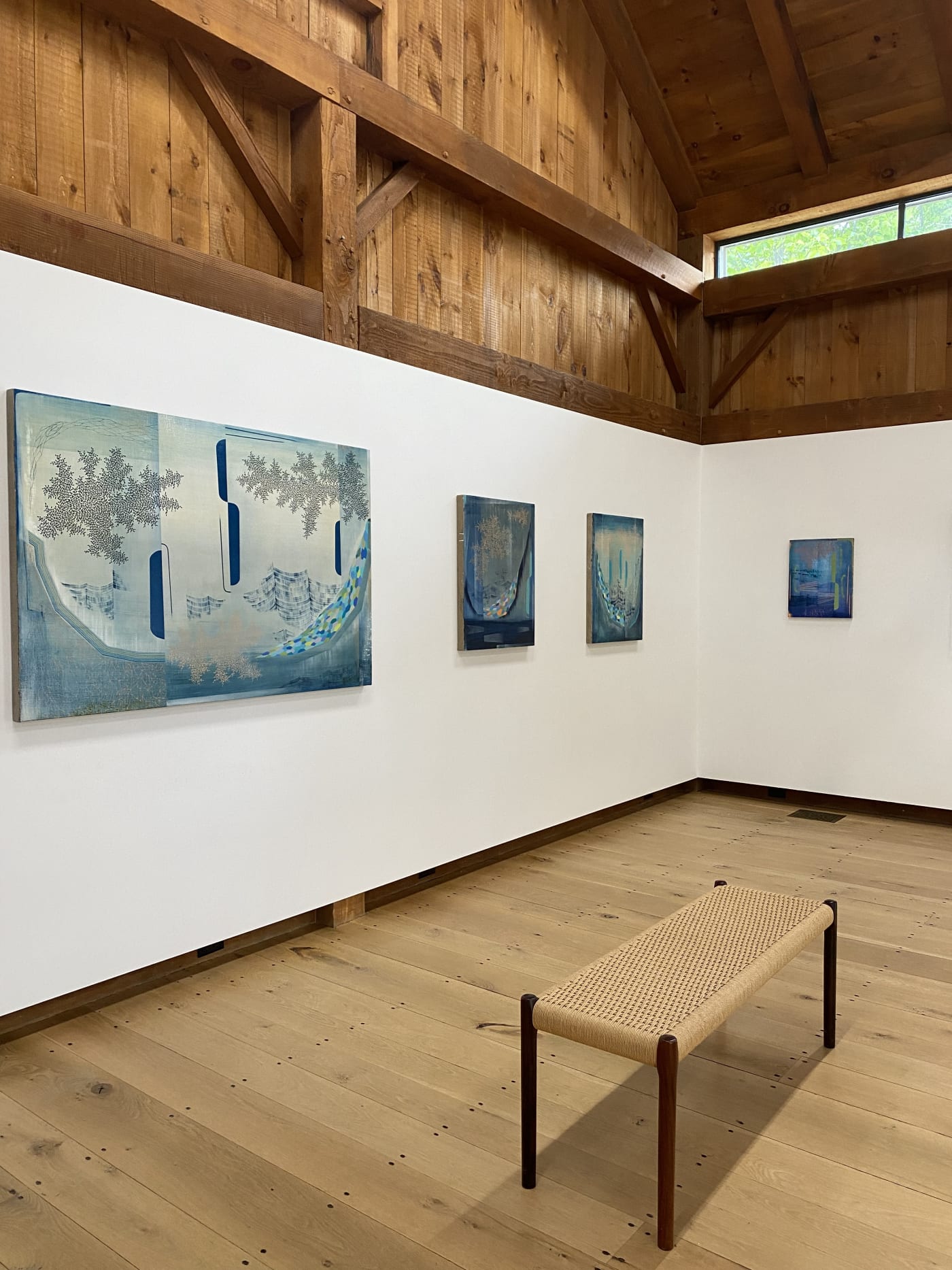 Installation view with paintings by Gabe Brown