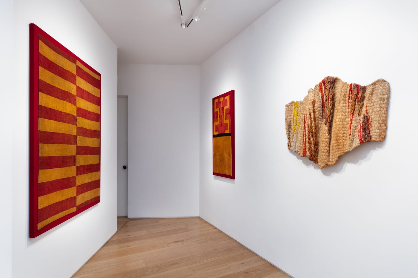 Installation shot Continuities: 2000 Years of Textiles in South America. Photographed by Angus Mill. Image courtesy of LAMB Gallery and PHFA.