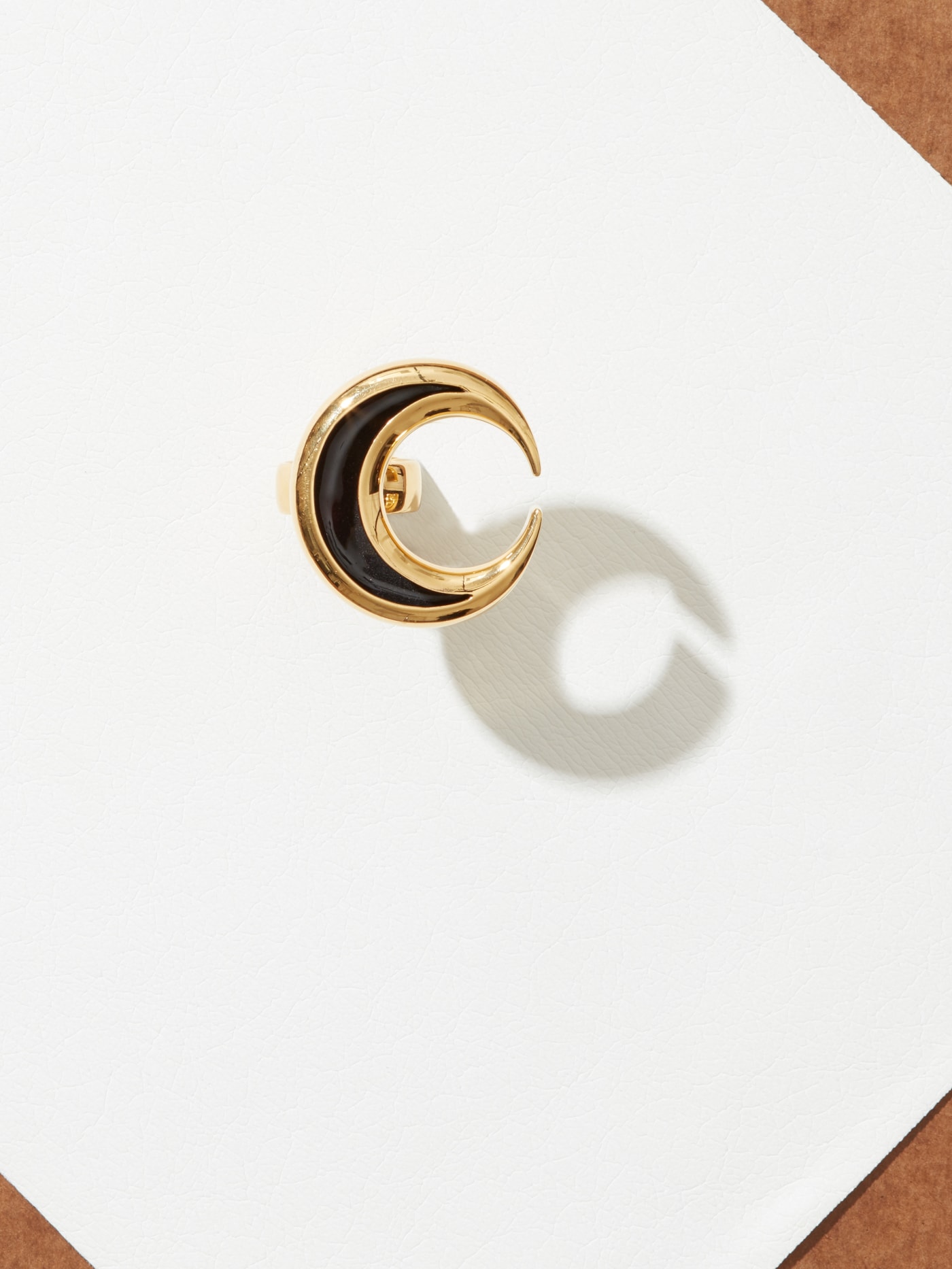 Anish Kapoor, Crescent Ring, Form V, 2004. 22k yellow polished exterior with violet enamel interior. Incised with the artist's signature, numbered & hallmarked, 4.0 x 3.8 x 1.0 cm, 55g, edition of 10 + 4 AP in collaboration with Louisa Guinness.