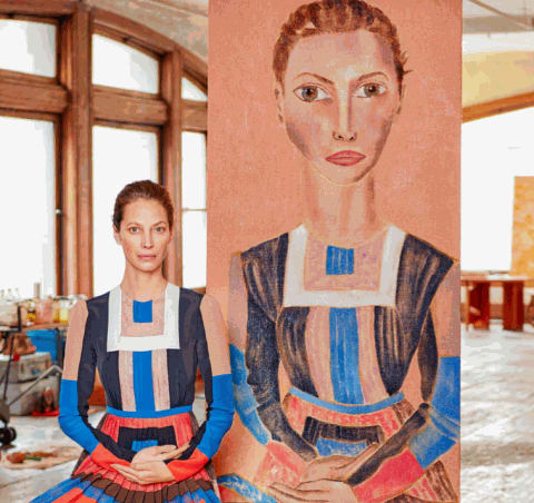 Christy Turlington and her portrait, painted by Francesco Clemente. Photo: Jason Schmidt, Courtesy of Harper's BAZAAR