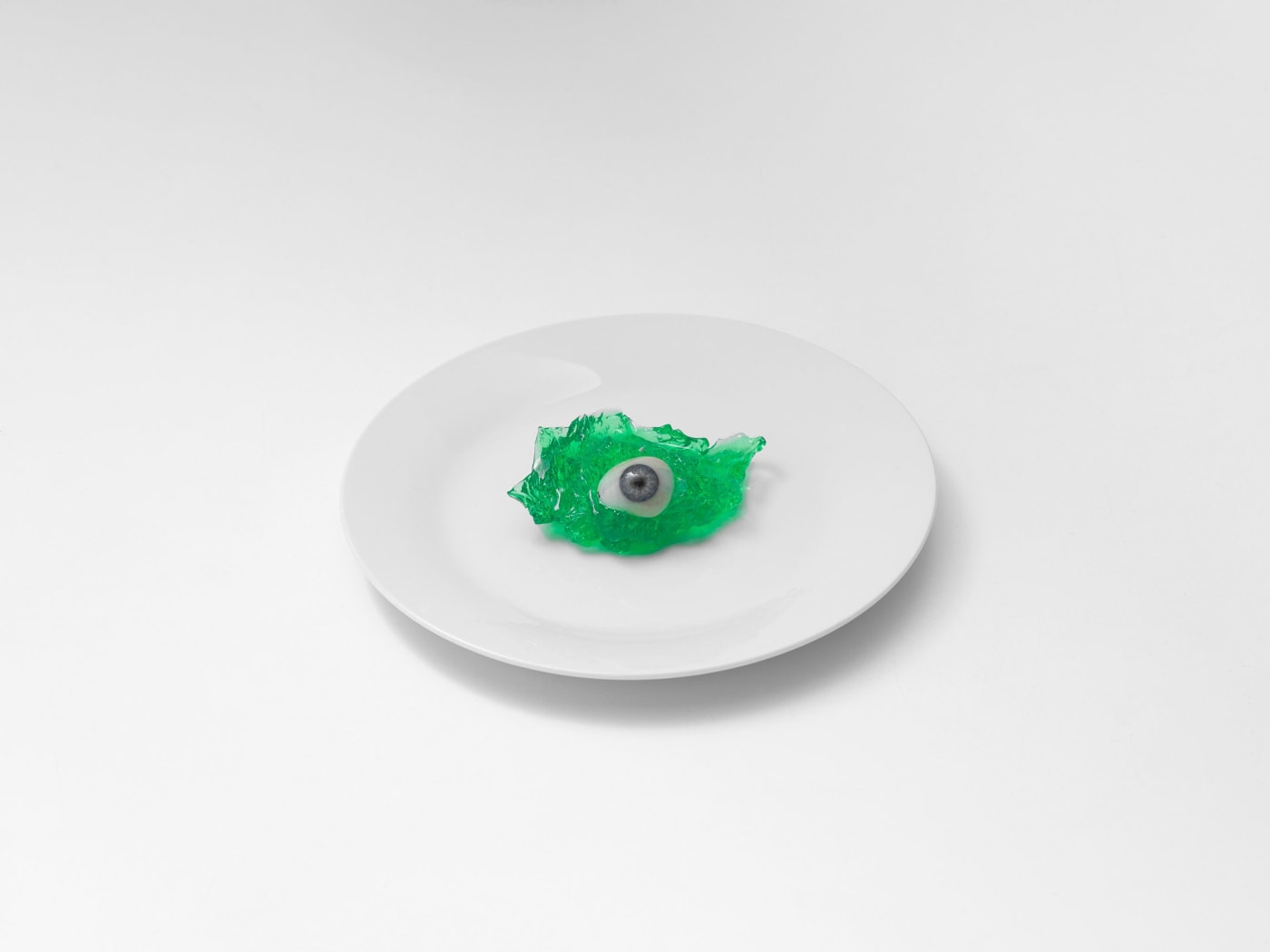 Brian Griffin, Glass Eye on White Plate, London, 2017