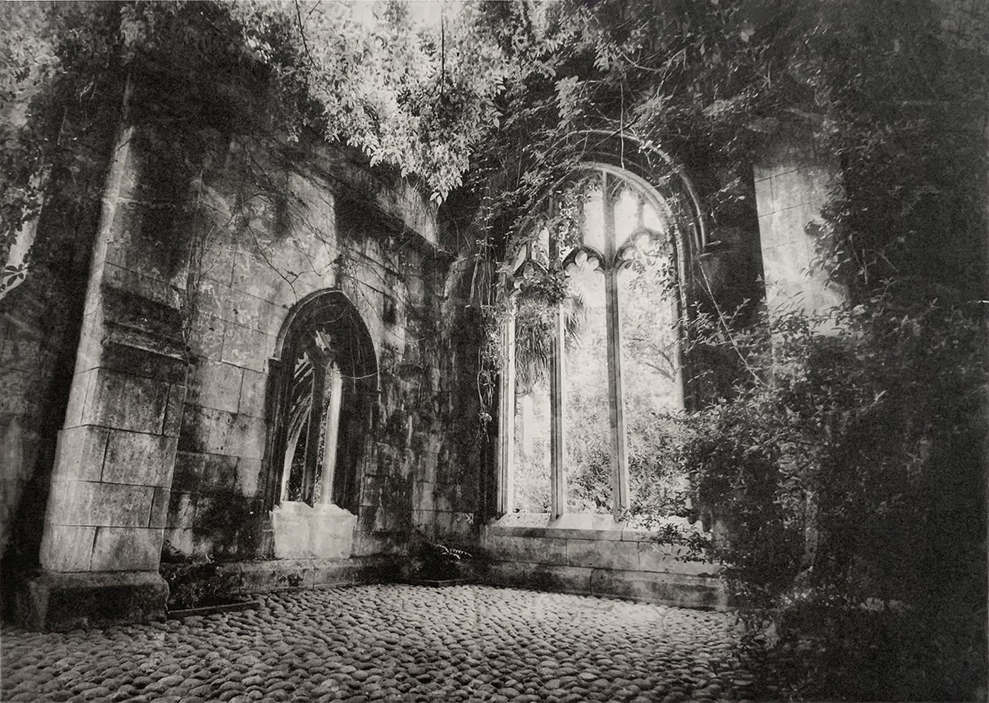 Lindsey Moran photogravure monochrome print of a large gothic window with a statue to its left