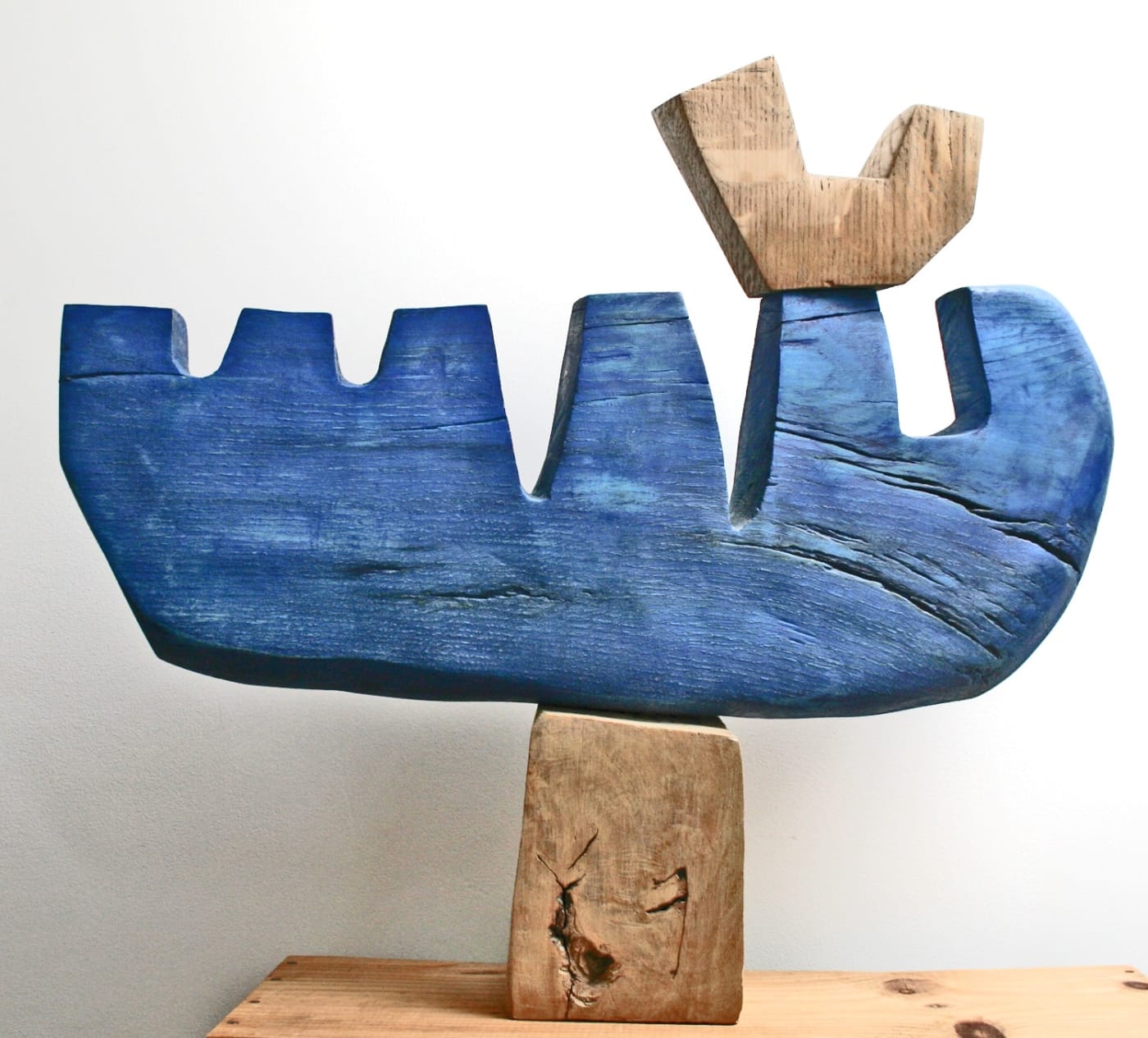 Caroline Saunders hand carved abstracted wooden sculpture in oak and blue paint