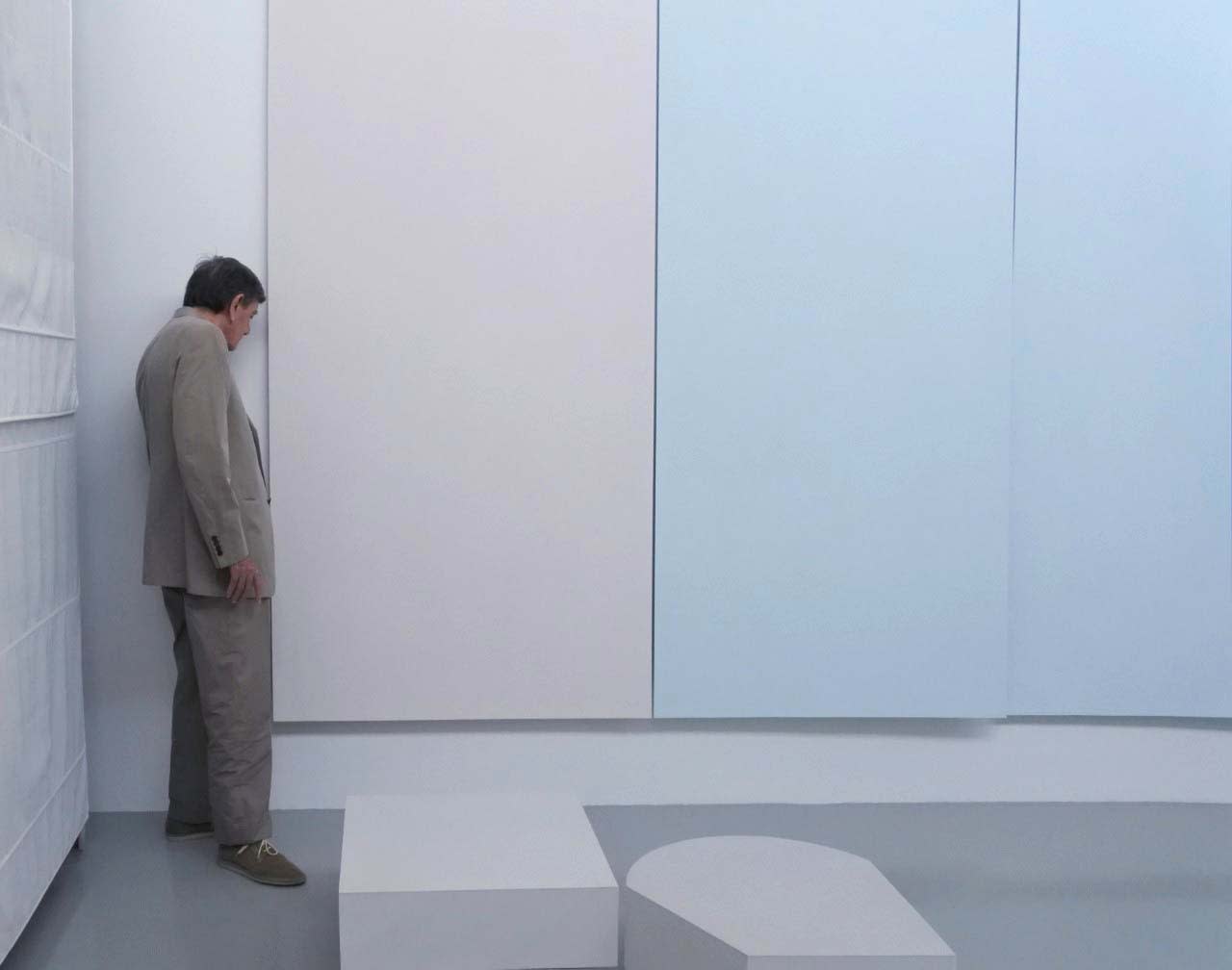 Spalletti examines his work in his studio.
