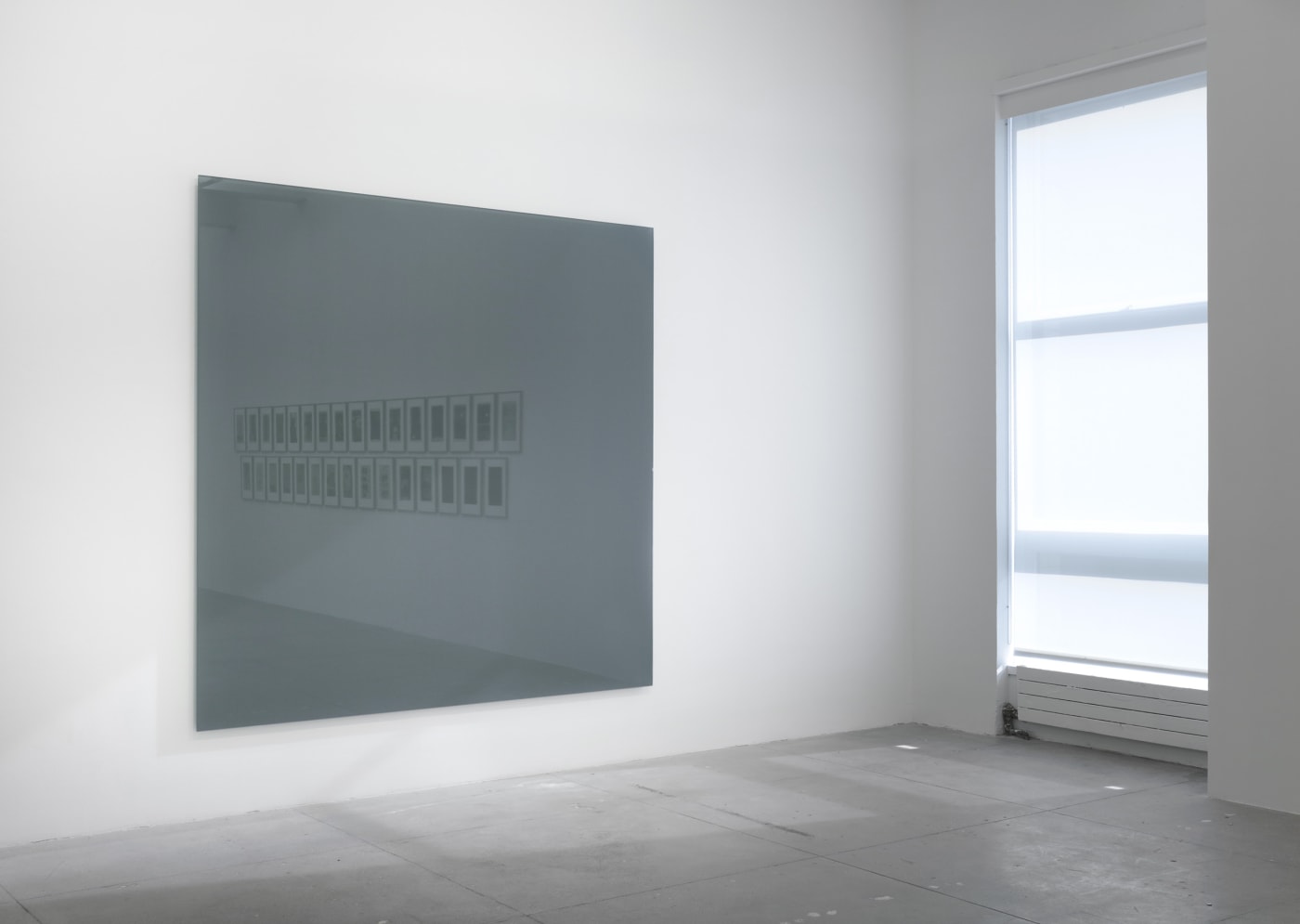Installation view of a Gerhard Richter artwork hanging near a window at Marian Goodman Gallery, New York