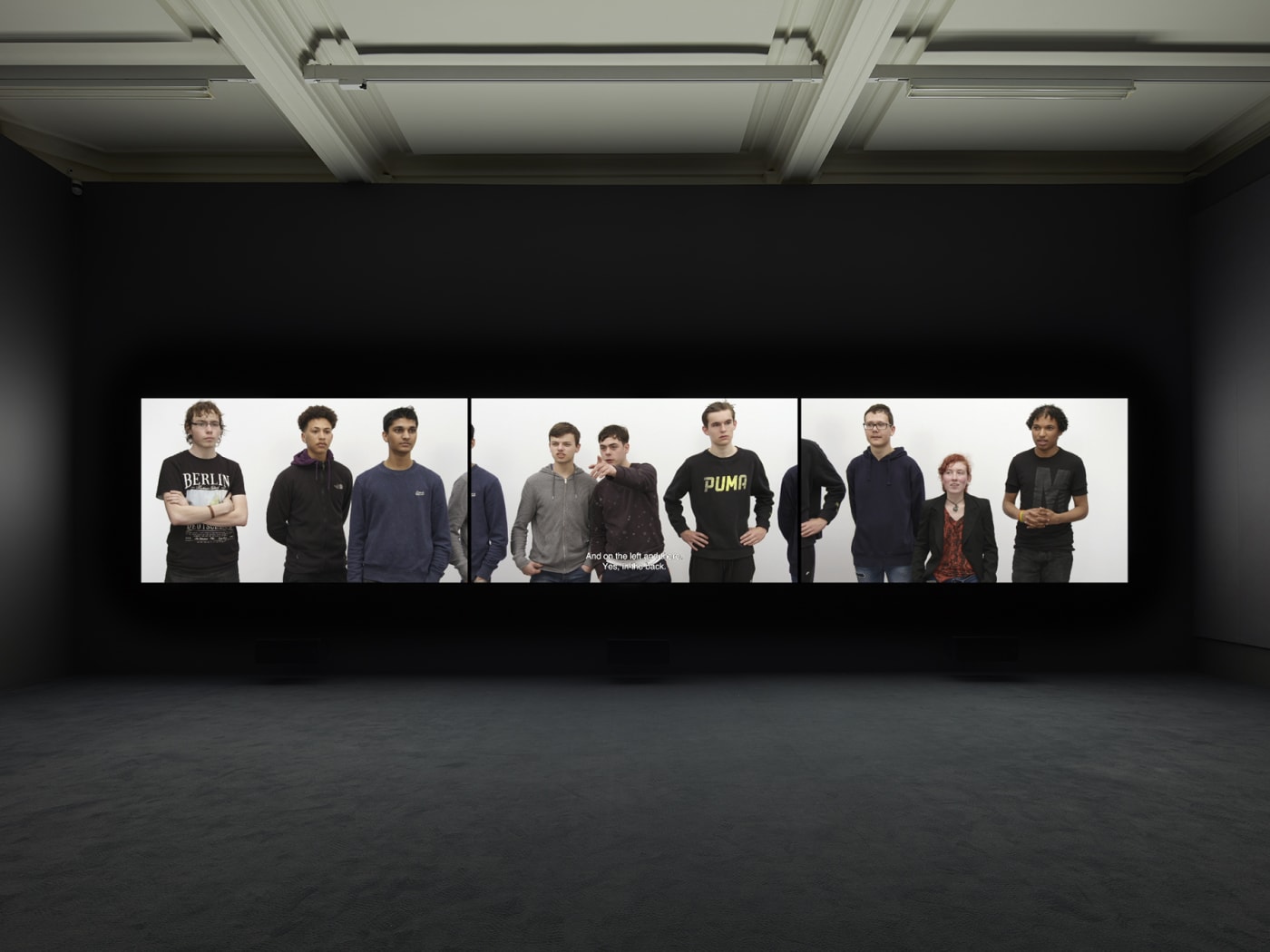 Installation view of Rineke Dijkstra's video projection "Nightwatching"