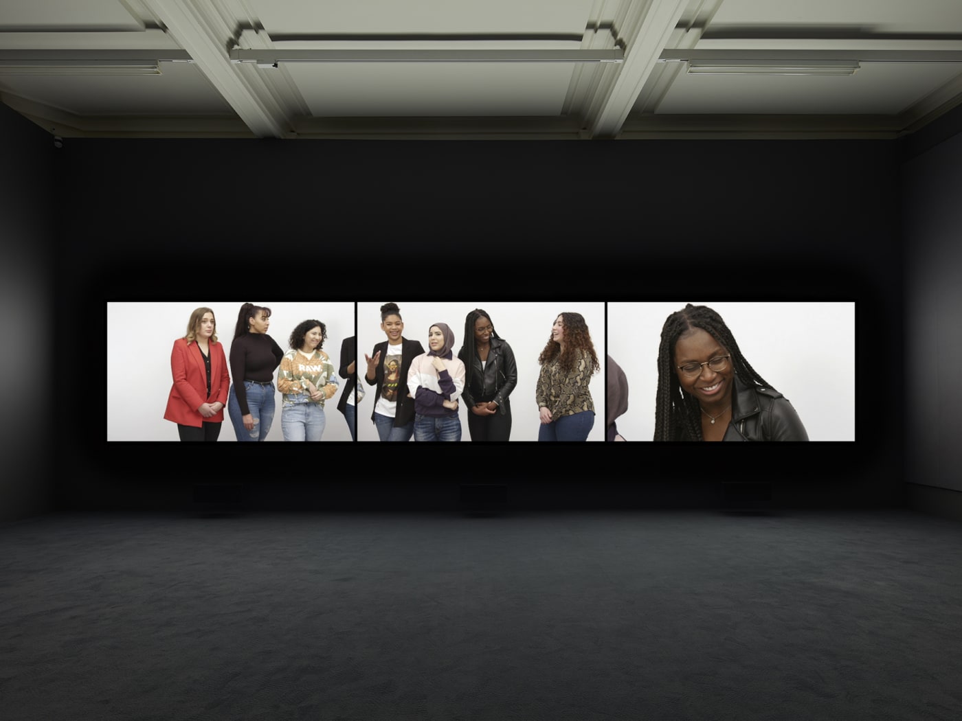 Installation view of Rineke Dijkstra's video projection "Nightwatching"