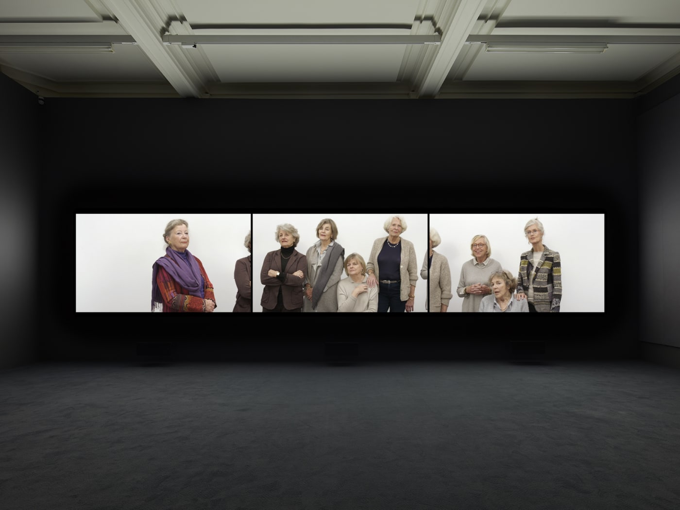 Installation view of Rineke Dijkstra's video projection "Nightwatching"