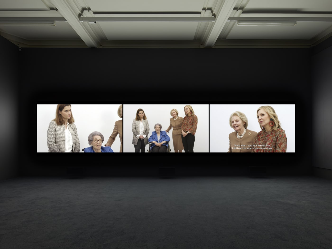 Installation view of Rineke Dijkstra's video projection "Nightwatching"