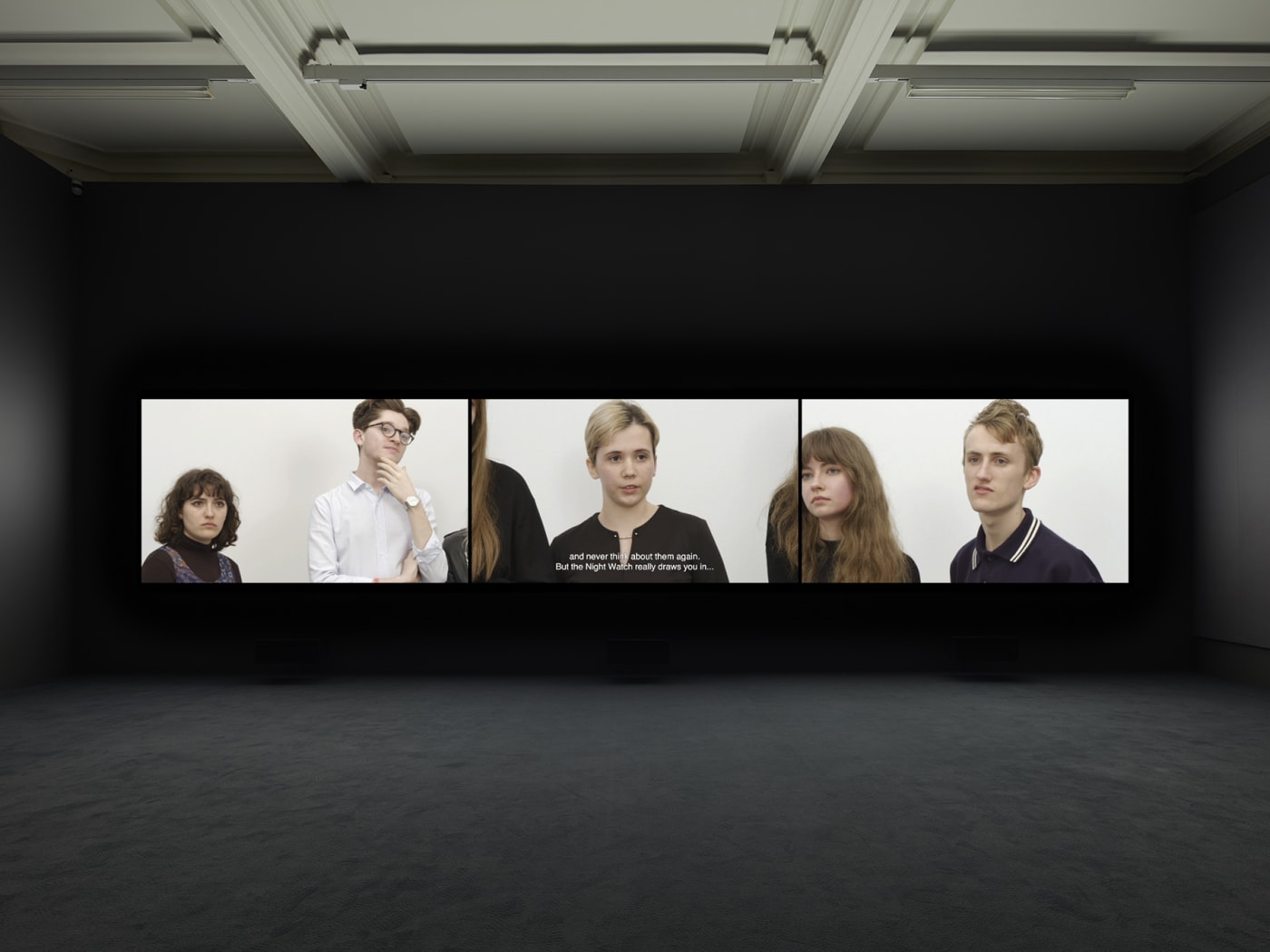 Installation view of Rineke Dijkstra's video projection "Nightwatching"