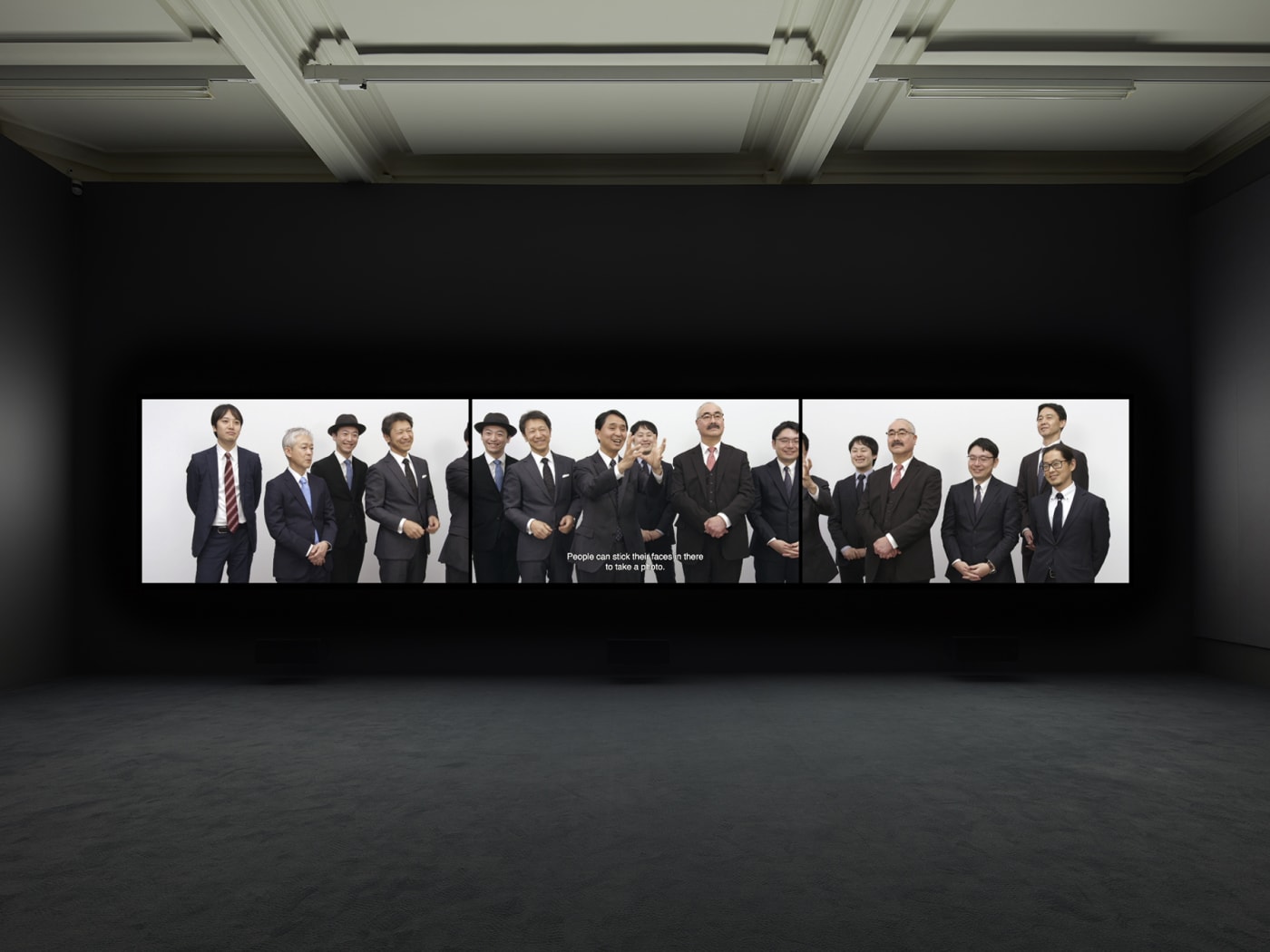 Installation view of Rineke Dijkstra's video projection "Nightwatching"