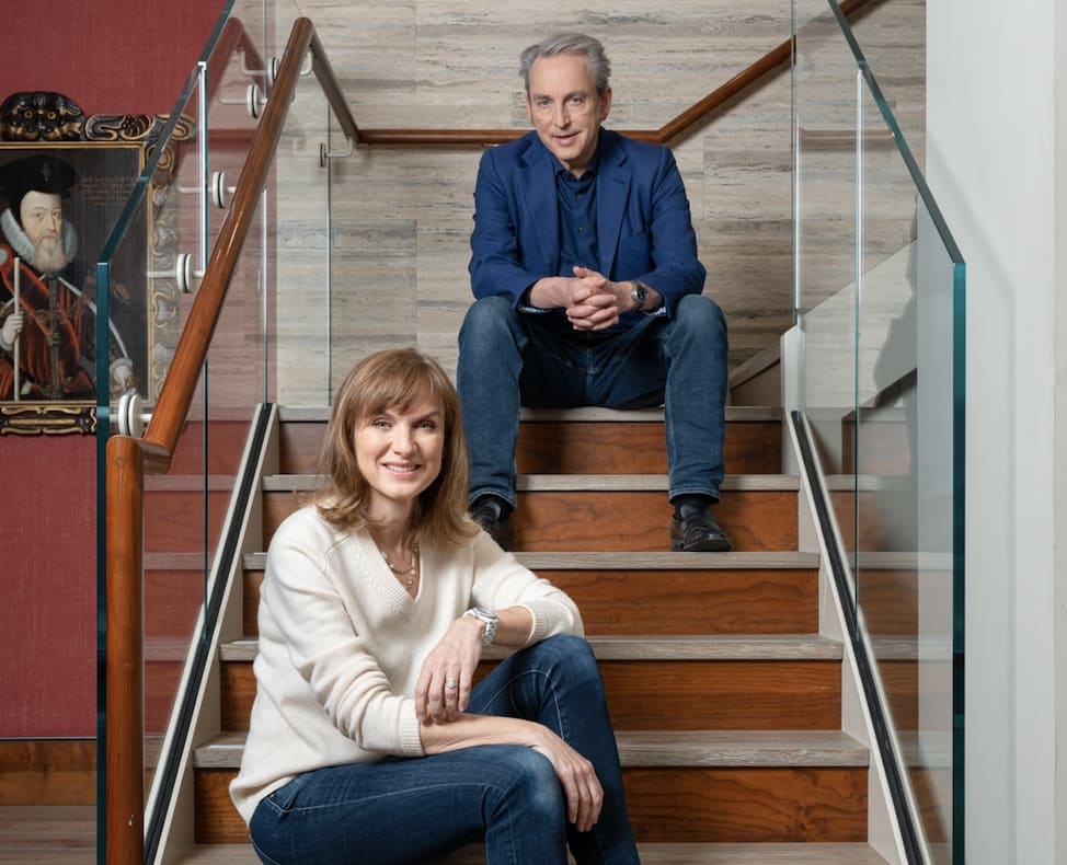 Philip and Fiona sitting on the stairs for Fake or Fortune press shots for the 9th series of Fake or Fortune.