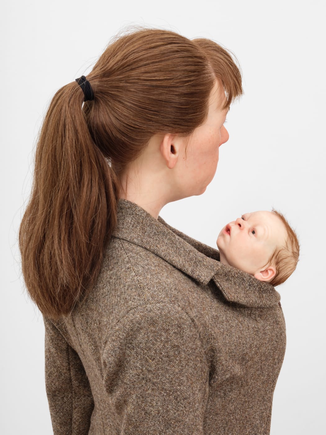 While Mueck’s first two works on the theme of motherhood explore the emotional resonances of pregnancy and birth, in Woman...