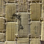 Ange Dakouo. Malian Artist. Contemporary African Art in Paris. AFIKARIS. Wall tapestries. Traditional artisanal techniques. Contemporary conceptual frameworks. Malian culture. Hybridity of techniques. Resilience. Global inequalities. Textile Artworks. Craftsmanship.