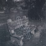 A monochromatic artwork depicting a photograph of a bench in a park separated by a geometrical structure screen printed in the middle of it