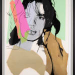 Andy Warhol screenprint of Mick Jagger looking straight at you with lime green background and pink and gold collage style overlays in the print in a black frame