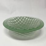 fused glass bowl with green and translucent plaid pattern