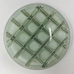 pale translucent green glass bowl with criss cross pattern