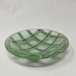 pale translucent green glass bowl with criss cross pattern