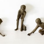 Marble players, small figurative bronze sculpture by Béatrice Cols, children playing marbles, poetic and narrative collectible artwork for indoor display
