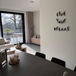 live your dream letter sculpture of Marc de Corte contemporary bronze sculpture personalized phrase poem word sculpture at Art Yi gallery in Brussels