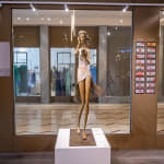 Behind the screen contemporary woman sculpture garden sculpture garden design monumental girl sculpture Hedwige Leroux bronze sculpture