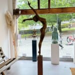 Shake it all off with me Marc de Corte dancing girl sculpture contemporary bronze sculpture naked dancing woman garden sculpture at Art Yi gallery in Brussels