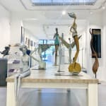 art exhibition hedwige leroux beautiful and fine contemporary city woman bronze sculpture with smart phone and dream art gallery brussels