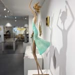 Moonlight dancing girl sculpture of Hedwige Leroux contemporary bronze sculpture dancer woman sculpture a girl in a green dress dancing freely Art Yi gallery in Brussels