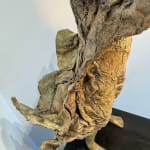 Visionary XL with light boy sculpture bronze sculpture of Lieven d'Haese garden sculpture boy opening arms to light up a light bulb in his hands with imagination magic dream contemporary art sculpture light interior design at Art Yi gallery in Brussels