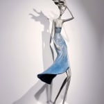 hedwige leroux, gone with wind, contemporary woman sculpture, a beautiful young girl walking in the wind with her blue dress fly to the sky Art Yi gallery Brussels art yi gallery