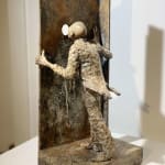 the Special hole lieven d'haese contempoary bronze sculpture art boy watches through a little hole for the future Art Yi gallery Brussels art gallery